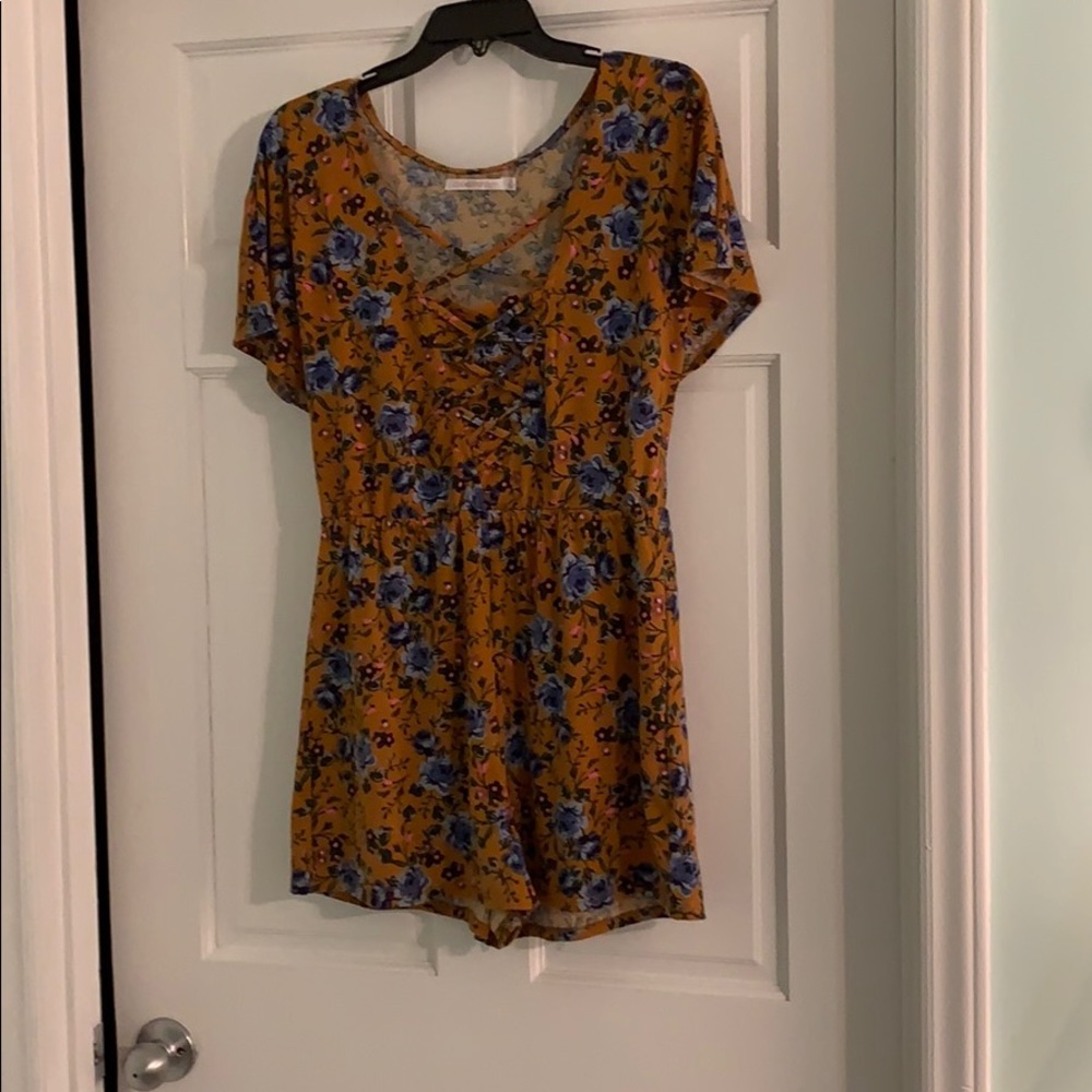 Adorable dark yellow romper with blue flower print